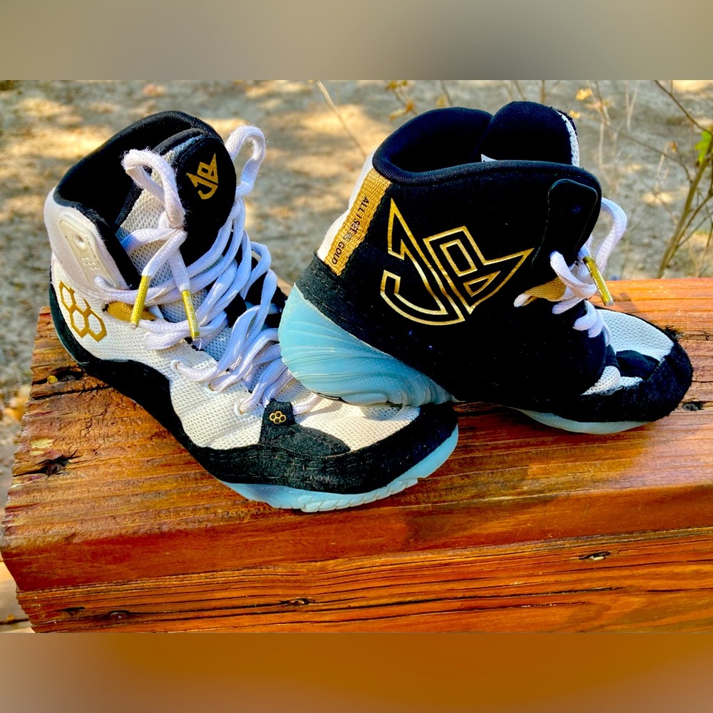 Size 1 Jordan Burroughs “All I See is Gold” wrestling shoes. Lightly used.